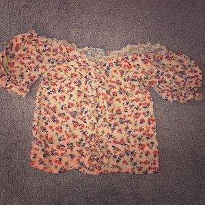 an off the shoulders crop top